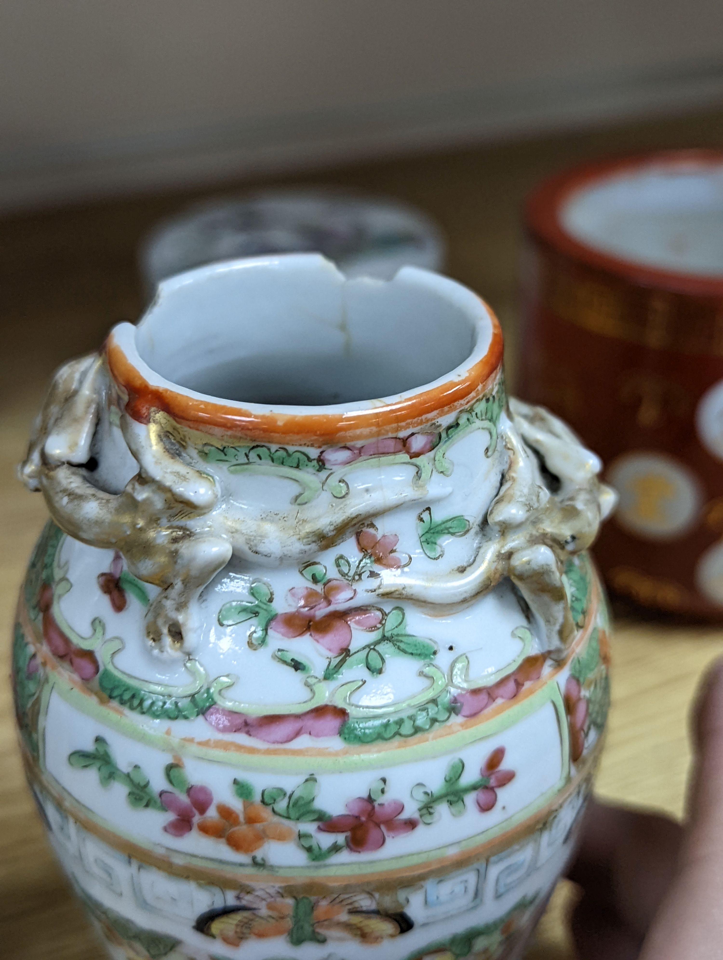 A group of Chinese famille rose vases and jars, a box and cover and a teapot, 19th/20th century, Pair of vases 13 cms high.